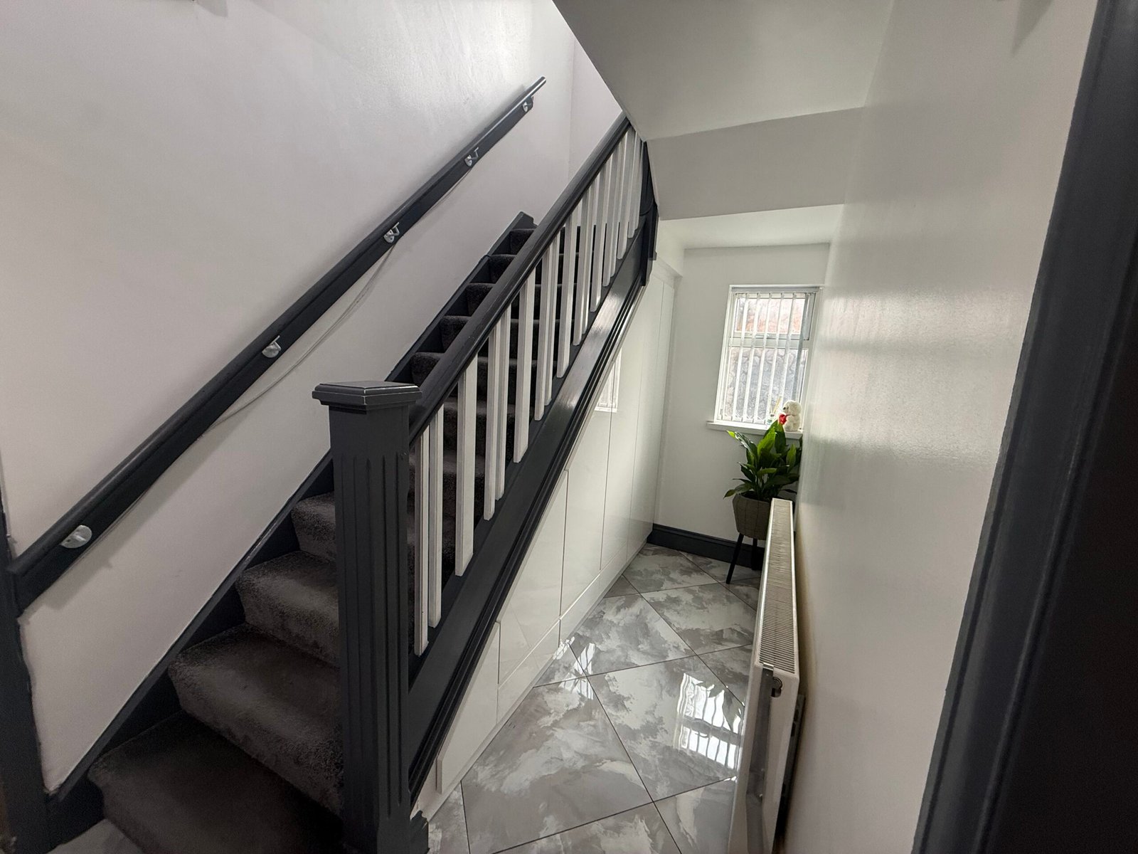 Elite Build completed home renovation and improvement projects in Birmingham and the West Midlands, including kitchen renovations, bathroom refurbishments, bespoke interiors, media walls, and garage conversions.