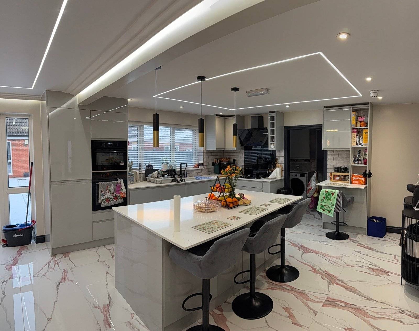 Luxury home renovation and improvement services in Birmingham and the West Midlands by Elite Build, featuring kitchen fitting, bathroom renovation, bespoke wardrobes, media walls, feature walls, garage conversions, and high-quality interior refurbishment.