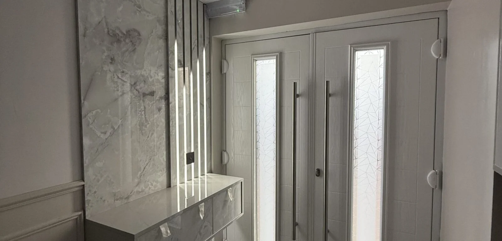 Luxury home renovation and improvement services in Birmingham and the West Midlands by Elite Build, featuring kitchen fitting, bathroom renovation, bespoke wardrobes, media walls, feature walls, garage conversions, and high-quality interior refurbishment.