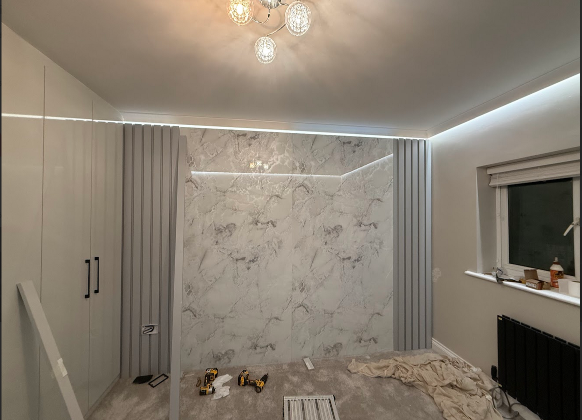 Elite Build completed home renovation and improvement projects in Birmingham and the West Midlands, including kitchen renovations, bathroom refurbishments, bespoke interiors, media walls, and garage conversions.