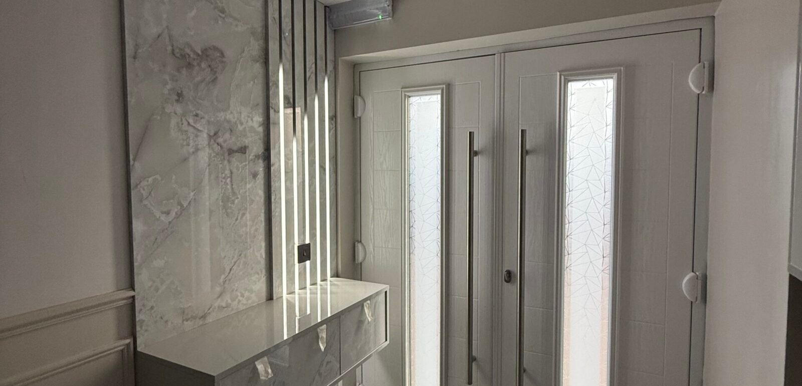 Elite Build completed home renovation and improvement projects in Birmingham and the West Midlands, including kitchen renovations, bathroom refurbishments, bespoke interiors, media walls, and garage conversions.