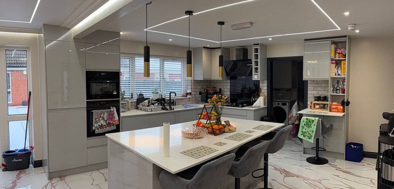 Luxury home renovation and improvement services in Birmingham and the West Midlands by Elite Build, featuring kitchen fitting, bathroom renovation, bespoke wardrobes, media walls, feature walls, garage conversions, and high-quality interior refurbishment.